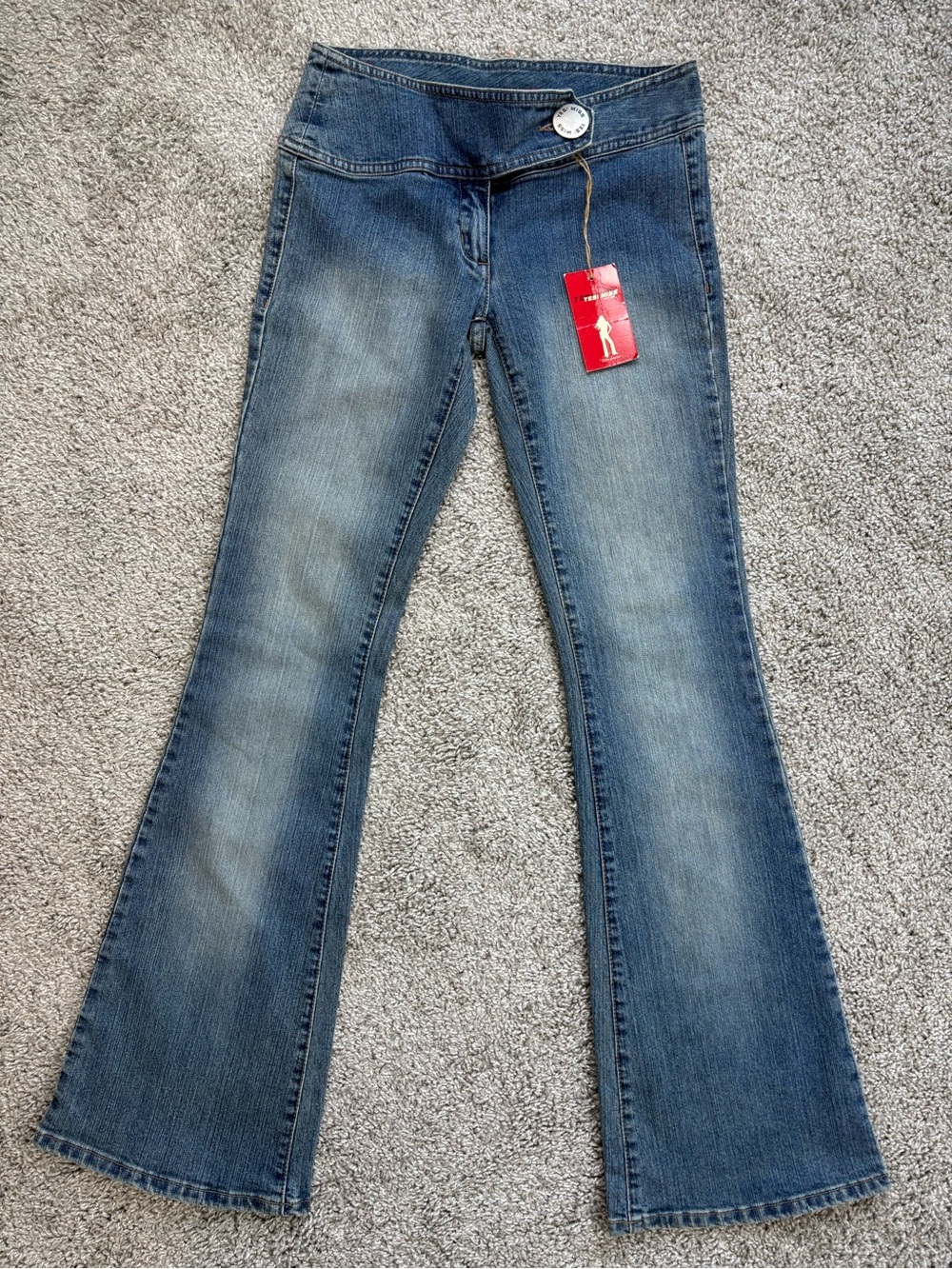 Mid Rise Blue Flare Jeans with Subtle Fading